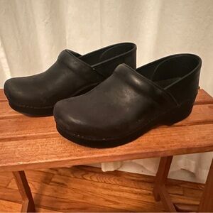 Dansko Black Leather Closed-Back Clogs